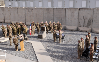The 451st Expeditionary Security Forces Squadron prepares to officially deactivate during a ceremony at Camp Losano, Kandahar Airfield, Afghanistan, Dec. 27, 2013. The squadron activated on July 17, 2006. (U.S. Air Force photo by Capt. Jason Smith)